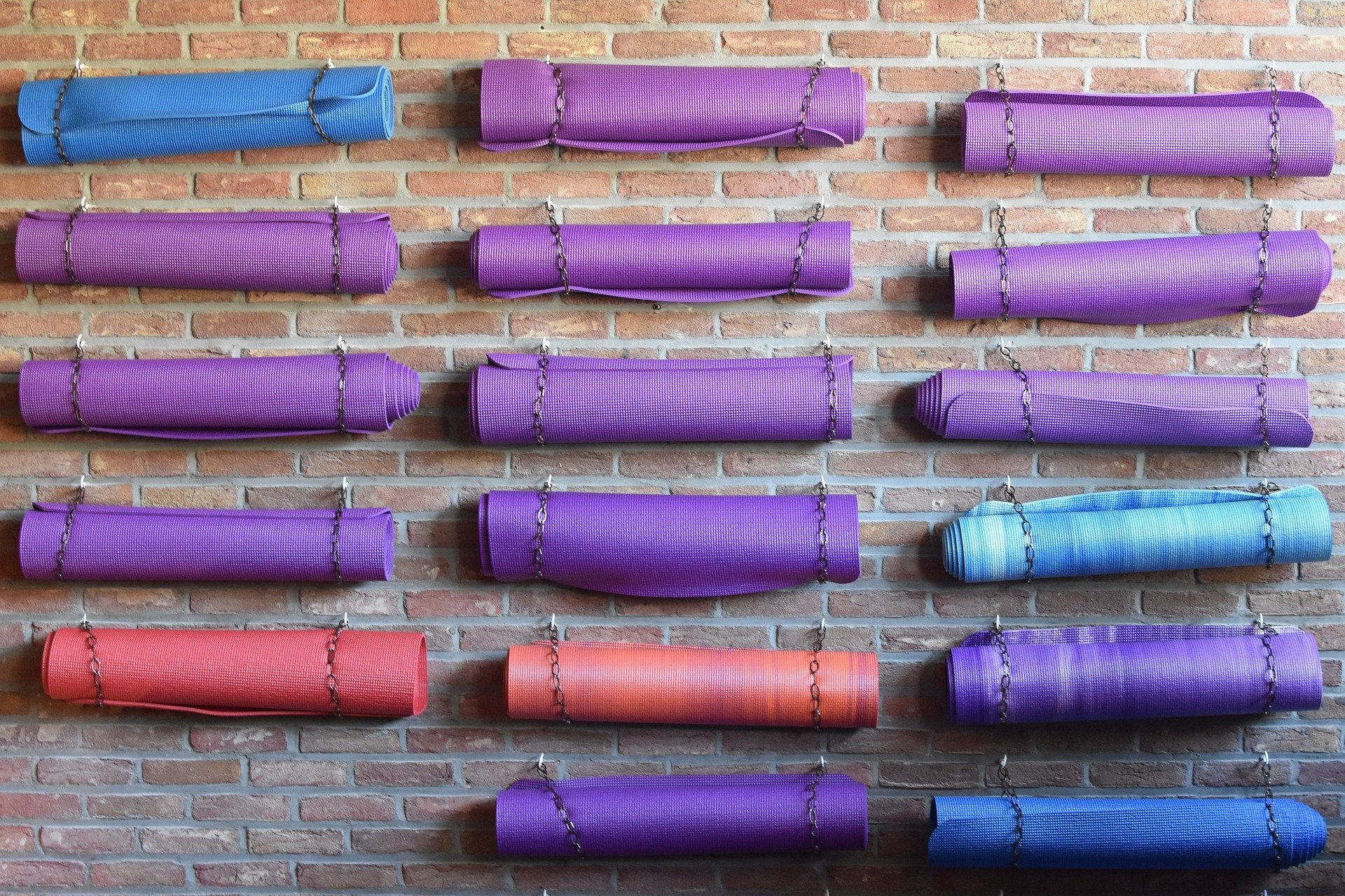 yoga mats on wall ways to use a small workout space